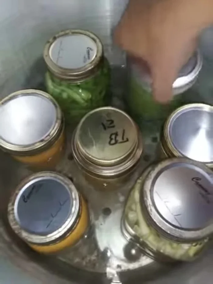 Place the next layer of jars on top of the ring.