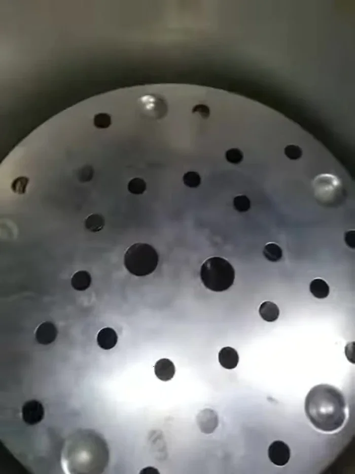 Repeat steps 3 and 4 for additional layers as needed. If you have extra jars, you can place them on the bottom of the pressure cooker to make efficient use of space